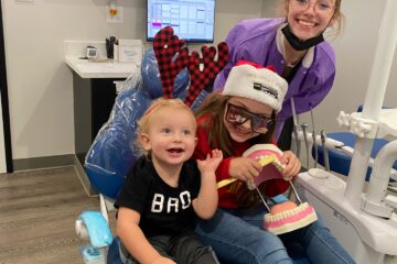 female nurse enjoying with patient at UR Smile Dental