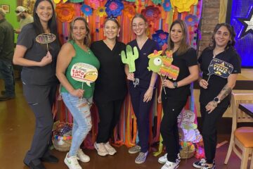 girls posing at halloween party at UR Smile Dental